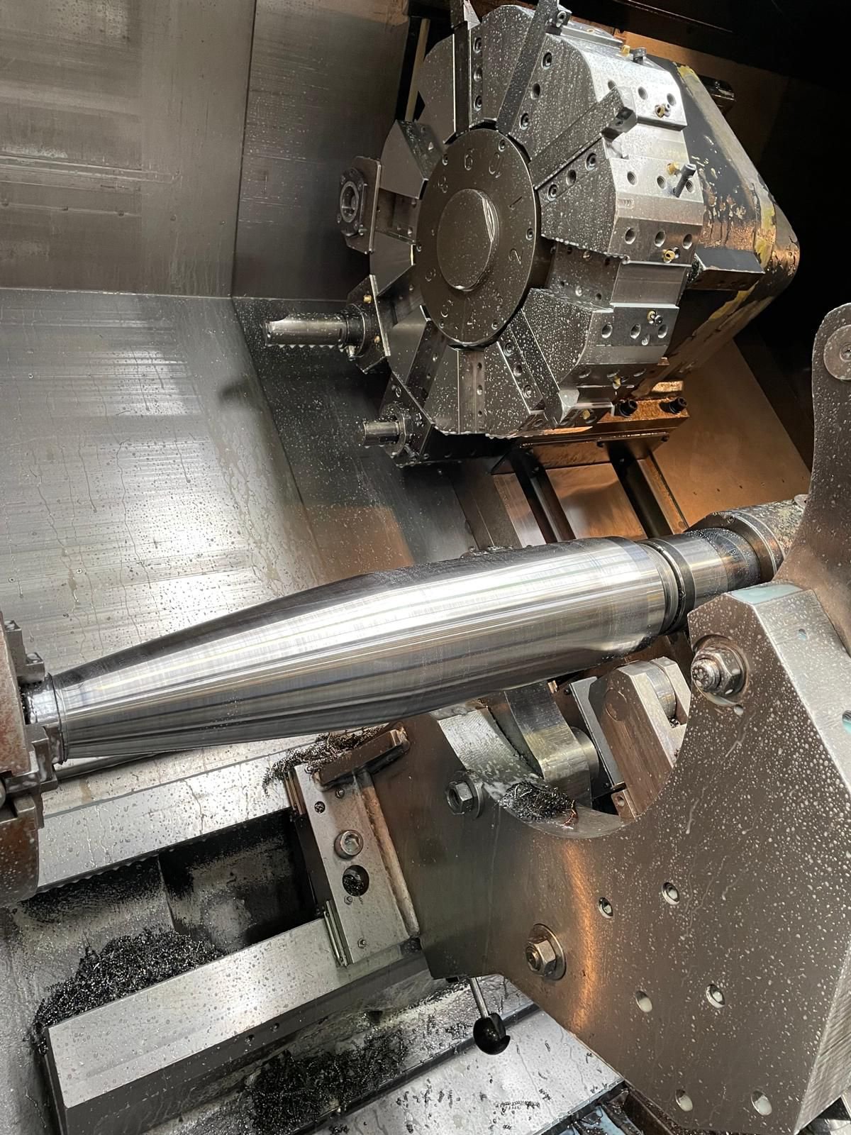 RAX 155 mm shell being machined, steel
